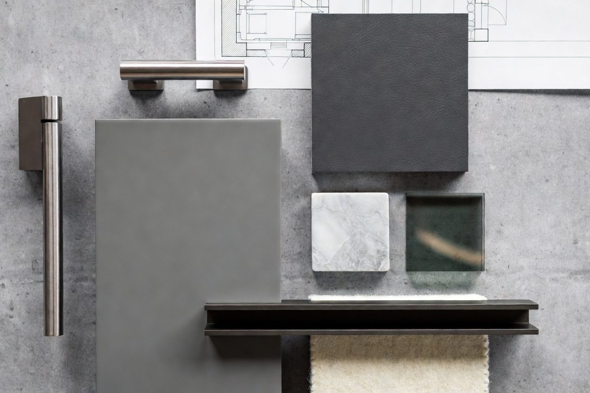 Milano Collection mood board — grey cement, dark leather, white Carrara marble, brushed steel hardware and architectural plans